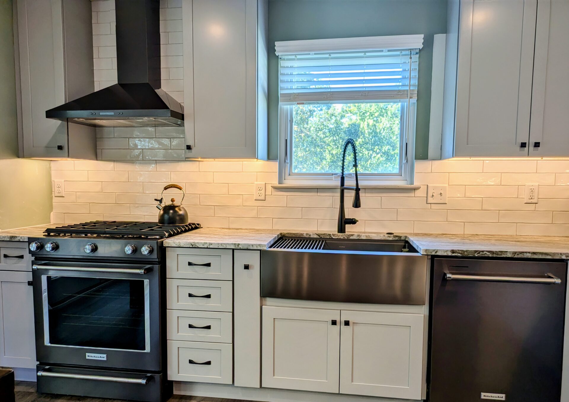 PXL_20240930_154612776~2 an image of a modular kitchen with lights and chairs